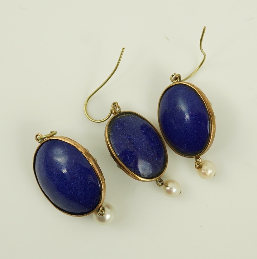 A Victorian gold, cabochon amethyst, enamel and seed pearl set lapis lazuli suite of jewellery